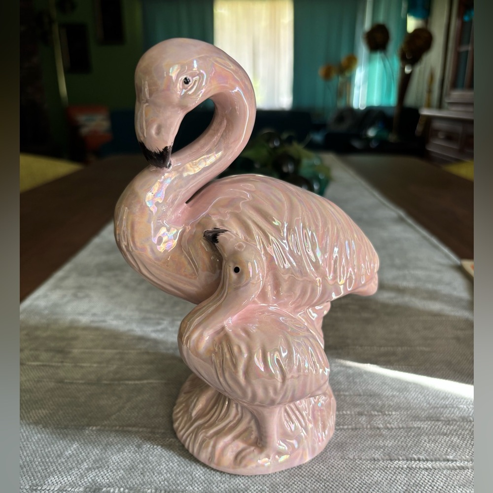 Ceramic flamingo and baby